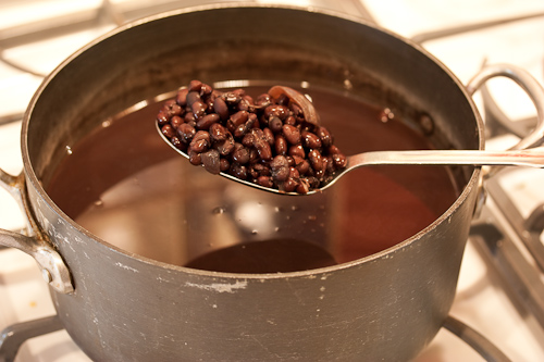 BlackBeans8 Just scoop them out with the slotted spoon, and don't worry about bringing along some of the cooking liquid -- some of it will be used anyway