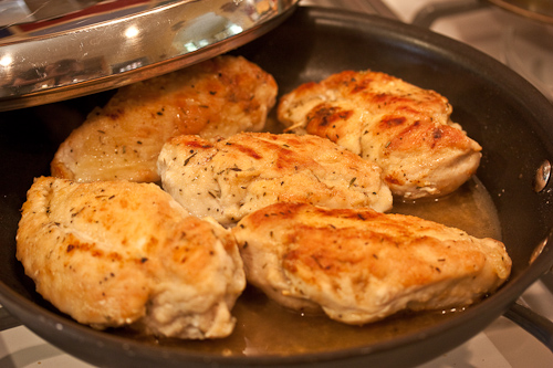 Chicken Simmer The little bit of flour will make a slightly thickened pan juice, and give the chicken a glossy coating