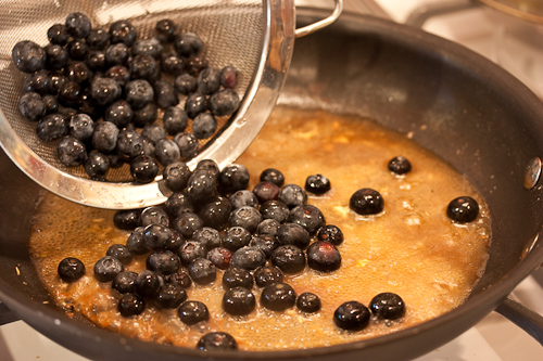 Add Blueberries Add the berries to the burbling pan juices