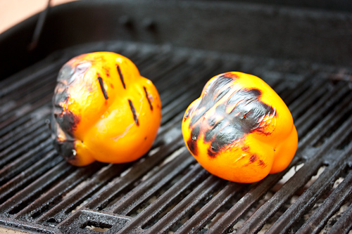 Keep rotating the peppers with tongs so that they blacken evenly