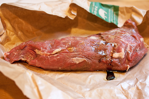 No need to measure -- just get enough on there to oil the beef all over