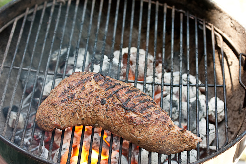 With the cover on but the vents wide open the tri-tip cooks with high heat but no flames