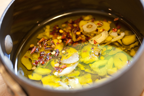 The smell of the garlic cooking is hard to resist