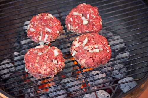 The fire is hot, too, but I put the top halfway on my Weber kettle when I cook burgers to keep the flare-ups to a minimum