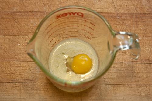 EggButter Add the egg first to the melted butter and mix well