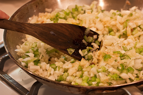 OnionSaute Sprinkle in some salt and pepper at this point -- it's important not to underseason stuffing
