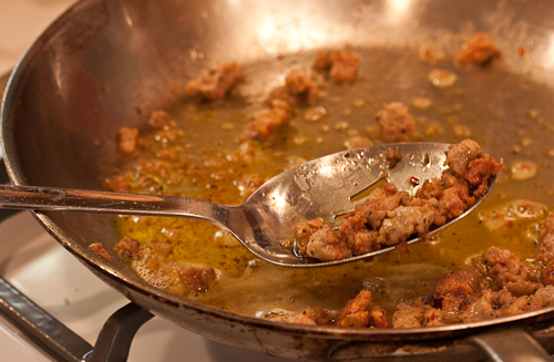 SausageDrain Scoop the sausage onto a small plate or into a bowl until needed