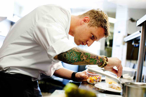 The tat on the other arm is a knife & fork