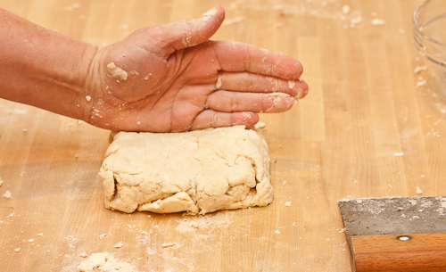 MoundDough2 Use the pastry scraper and the side of your hand to form it into a square