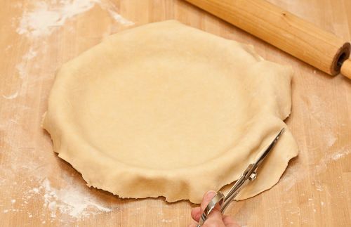 RollCrust7 Trim the crust (easiest with scissors), leaving a 3/4-inch overhand