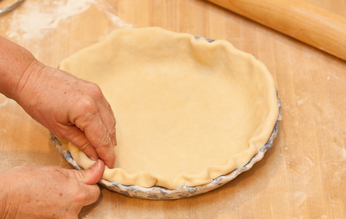 RollCrust9 Using your thumb, flute the edge of the dough