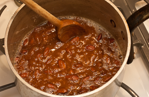 The mixture begins to get very dark at this point -- if it get darker than the almonds, take the pan off the heat but continue to stir for the full 7 minutes