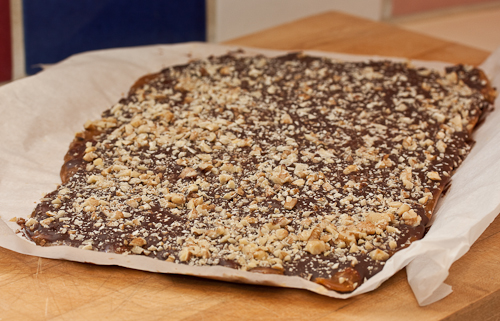 It's easier to break on a hard surface than in the pan